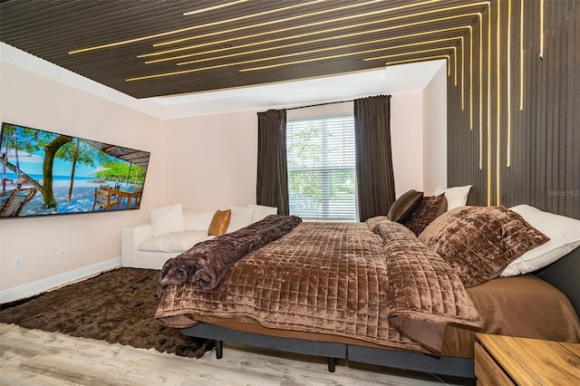 1660 Tropical Palms Cir, Kissimmee, FL 34747 - bedroom with baseboards and wood finished floors