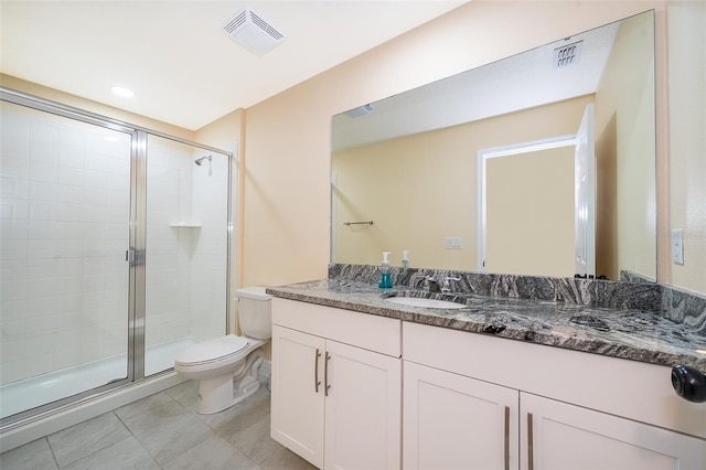 1660 Tropical Palms Cir, Kissimmee, FL 34747 - bathroom featuring vanity, a shower stall, and tile patterned flooring