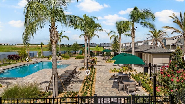 2117 Stake Out Way, Apopka, FL 32703 - community pool with a patio area and a water view