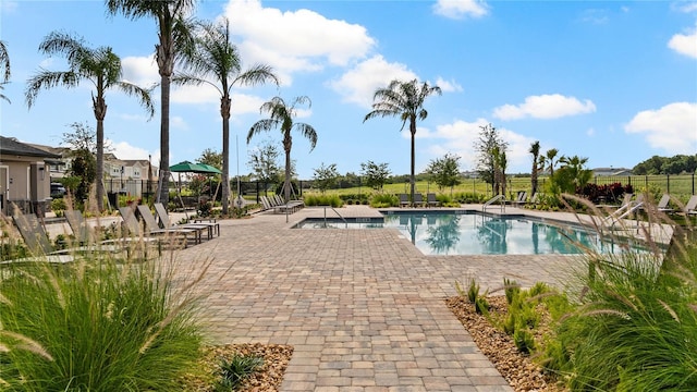 2117 Stake Out Way, Apopka, FL 32703 - community pool featuring a patio area