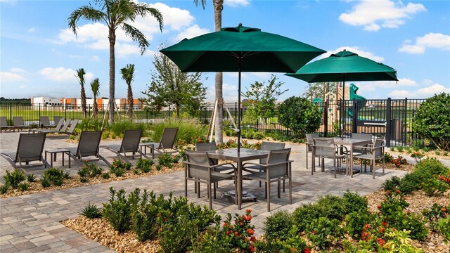 2347 Rider Rain Ln, Apopka, FL 32703 - view of patio / terrace with outdoor dining space