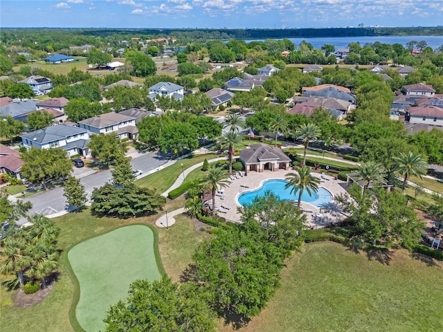 8827 Arrabida Ln, Orlando, FL 32836 - aerial perspective of suburban area with a pool and a nearby body of water