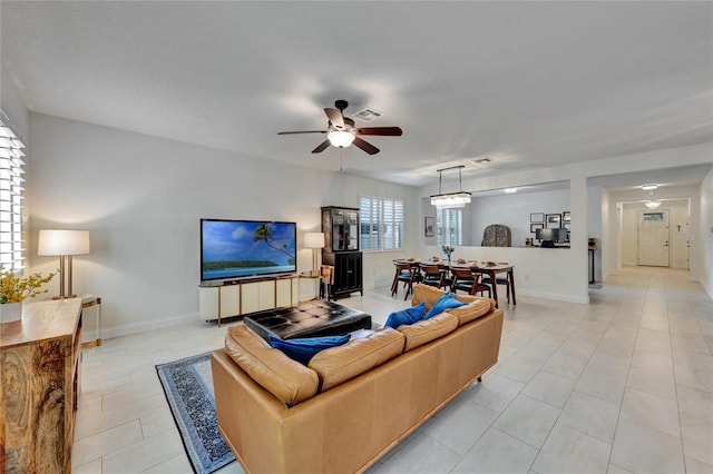 8827 Arrabida Ln, Orlando, FL 32836 - living room with a ceiling fan and baseboards