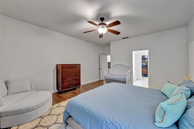 8827 Arrabida Ln, Orlando, FL 32836 - bedroom with wood finished floors and ceiling fan