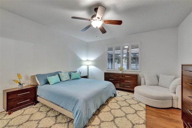 8827 Arrabida Ln, Orlando, FL 32836 - bedroom featuring wood finished floors and ceiling fan