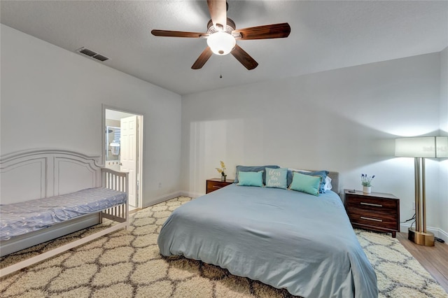 8827 Arrabida Ln, Orlando, FL 32836 - bedroom featuring ceiling fan and wood finished floors