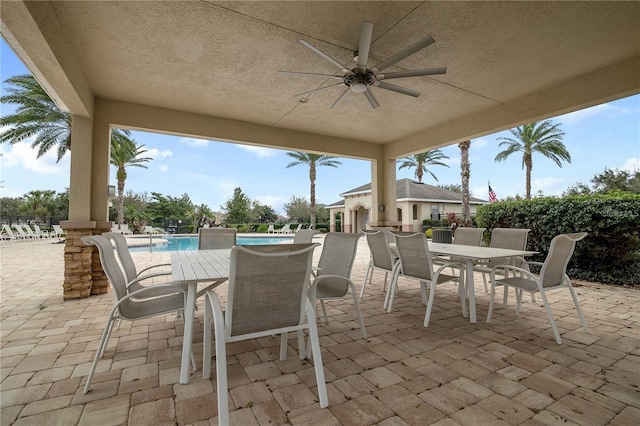 8827 Arrabida Ln, Orlando, FL 32836 - view of patio / terrace with outdoor dining space and ceiling fan