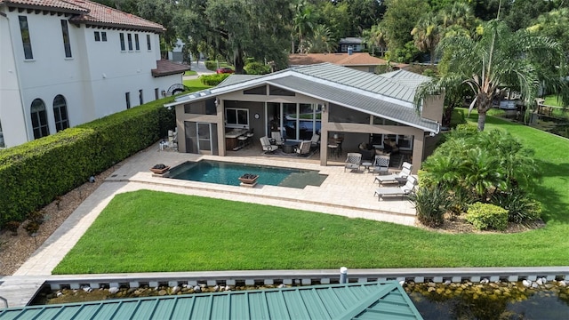 9070 Ron Den Ln, Windermere, FL 34786 - back of property with a patio area and an outdoor pool
