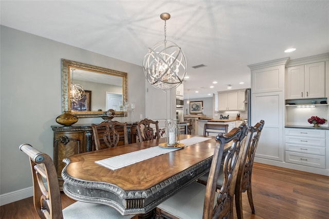 9070 Ron Den Ln, Windermere, FL 34786 - dining space featuring a chandelier, dark wood-style floors, and recessed lighting