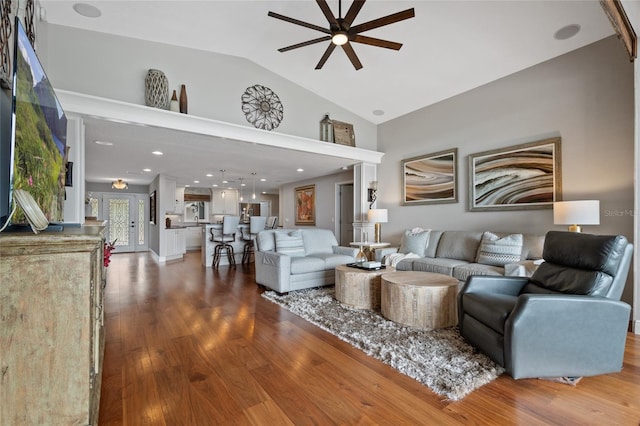 9070 Ron Den Ln, Windermere, FL 34786 - living area with a ceiling fan, wood finished floors, and high vaulted ceiling