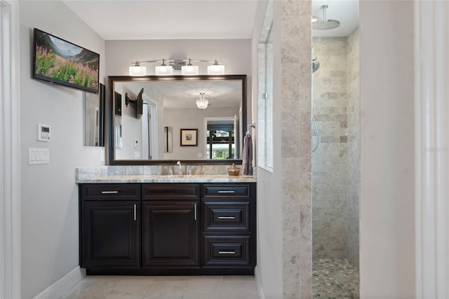 9070 Ron Den Ln, Windermere, FL 34786 - bathroom featuring vanity, walk in shower, and tile patterned floors