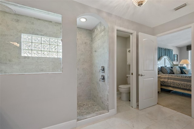 9070 Ron Den Ln, Windermere, FL 34786 - ensuite bathroom with a walk in shower and toilet