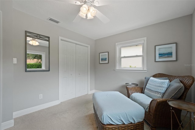9070 Ron Den Ln, Windermere, FL 34786 - living area featuring a ceiling fan, plenty of natural light, and carpet floors