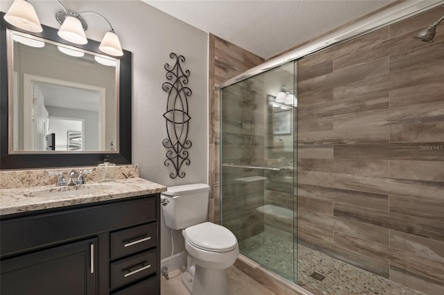 9070 Ron Den Ln, Windermere, FL 34786 - bathroom with tiled shower, vanity, and a textured ceiling