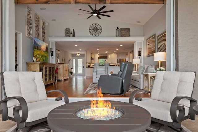 9070 Ron Den Ln, Windermere, FL 34786 - living area with lofted ceiling, wood finished floors, and a ceiling fan