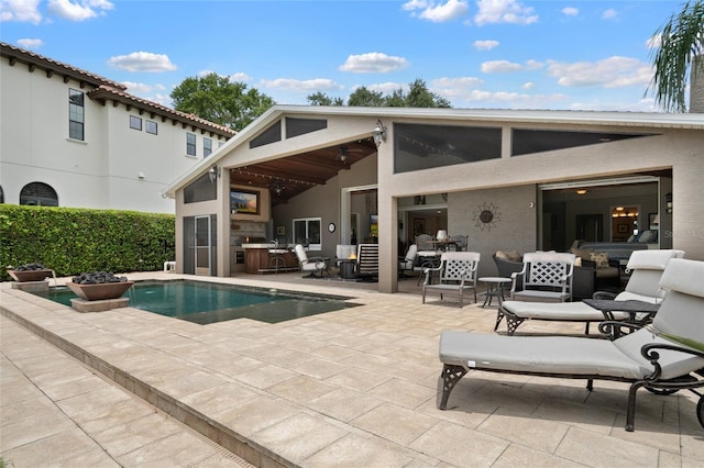 9070 Ron Den Ln, Windermere, FL 34786 - rear view of property featuring a patio and stucco siding