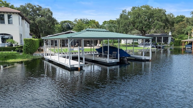 9070 Ron Den Ln, Windermere, FL 34786 - dock area featuring a water view and boat lift