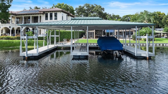 9070 Ron Den Ln, Windermere, FL 34786 - dock featuring a water view and boat lift