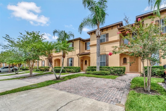216 Bergamo Dr, Davenport, FL 33897 - view of front of house with stucco siding