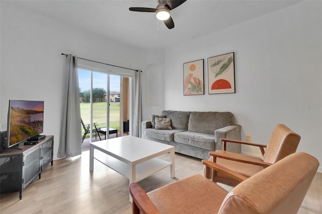 216 Bergamo Dr, Davenport, FL 33897 - living room featuring ceiling fan and light wood-style flooring