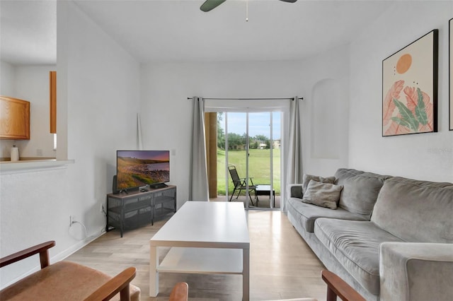 216 Bergamo Dr, Davenport, FL 33897 - living area featuring light wood finished floors and ceiling fan