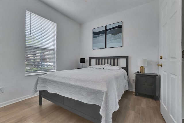 216 Bergamo Dr, Davenport, FL 33897 - bedroom featuring wood finished floors