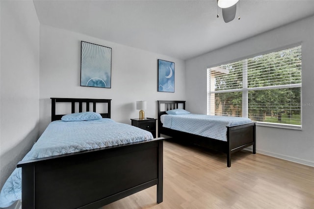 216 Bergamo Dr, Davenport, FL 33897 - bedroom featuring light wood-style floors and a ceiling fan