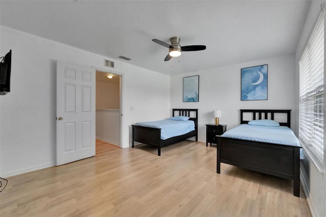 216 Bergamo Dr, Davenport, FL 33897 - bedroom featuring light wood finished floors and a ceiling fan