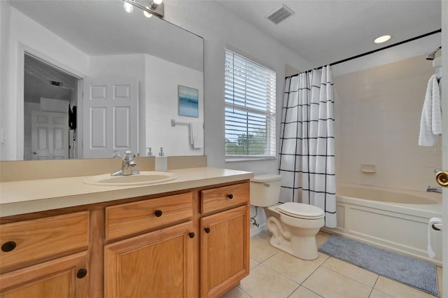216 Bergamo Dr, Davenport, FL 33897 - full bathroom featuring tile patterned flooring, vanity, and shower / tub combo with curtain