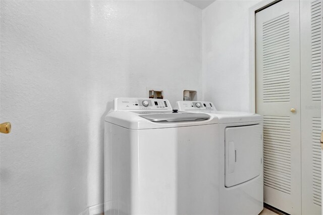 216 Bergamo Dr, Davenport, FL 33897 - laundry room with washer and clothes dryer