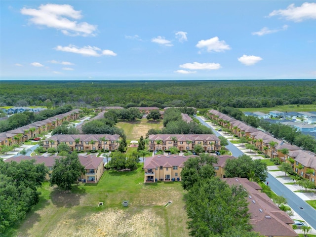 216 Bergamo Dr, Davenport, FL 33897 - aerial view of residential area featuring a forest