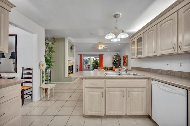 1238 Palmetto Rd, Eustis, FL 32726 - kitchen with dishwasher, a peninsula, a ceiling fan, light tile patterned floors, and pendant lighting