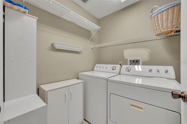 1238 Palmetto Rd, Eustis, FL 32726 - washroom with washer and clothes dryer and cabinet space