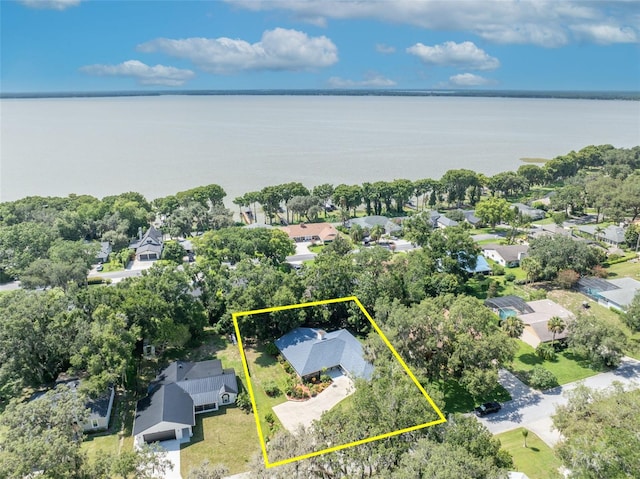 1238 Palmetto Rd, Eustis, FL 32726 - aerial perspective of suburban area featuring property parcel outlined and a nearby body of water
