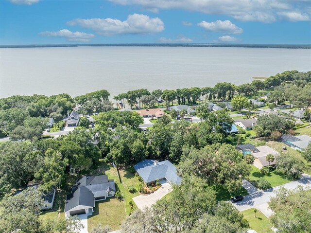1238 Palmetto Rd, Eustis, FL 32726 - aerial view of property and surrounding area with nearby suburban area and a nearby body of water