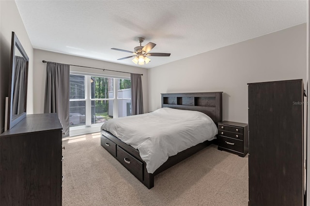 1041 Mccully Ct, Oviedo, FL 32765 - bedroom featuring light colored carpet, a ceiling fan, and a textured ceiling