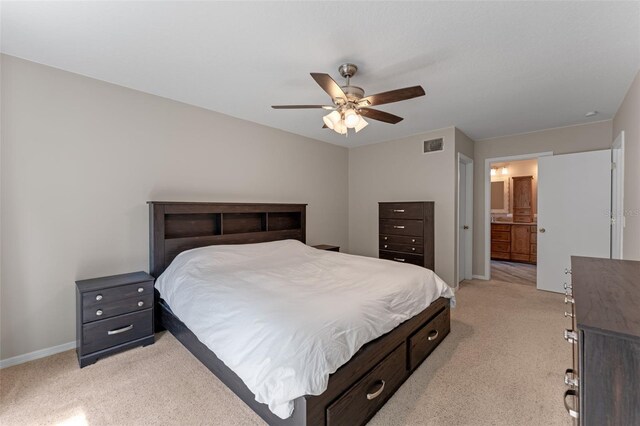 1041 Mccully Ct, Oviedo, FL 32765 - bedroom featuring light colored carpet, a ceiling fan, and ensuite bathroom