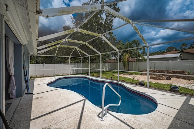 4045 Simkins Ave, North Port, FL 34286 - view of pool featuring a patio area, a fenced backyard, and a lanai
