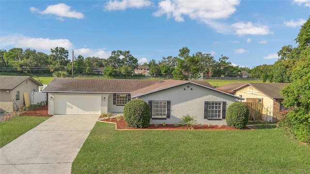 5904 Altec Rd, Orlando, FL 32808 - ranch-style home with stucco siding, driveway, and a garage
