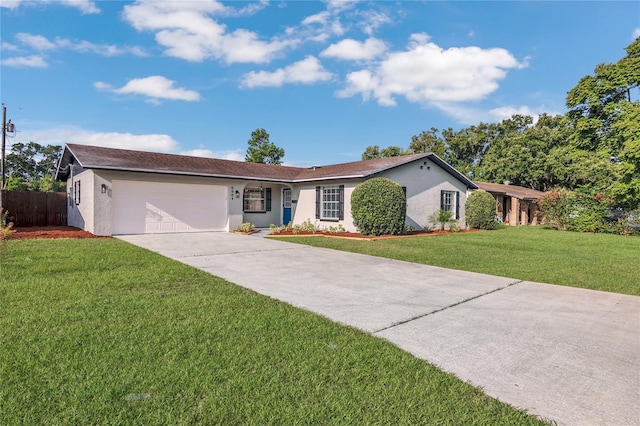 5904 Altec Rd, Orlando, FL 32808 - ranch-style home featuring an attached garage, concrete driveway, and stucco siding