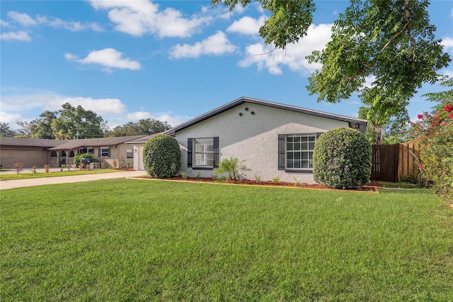 5904 Altec Rd, Orlando, FL 32808 - single story home featuring stucco siding and concrete driveway