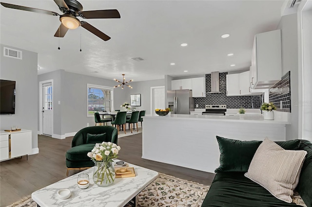 5904 Altec Rd, Orlando, FL 32808 - living area with dark wood-style floors, a chandelier, recessed lighting, and ceiling fan