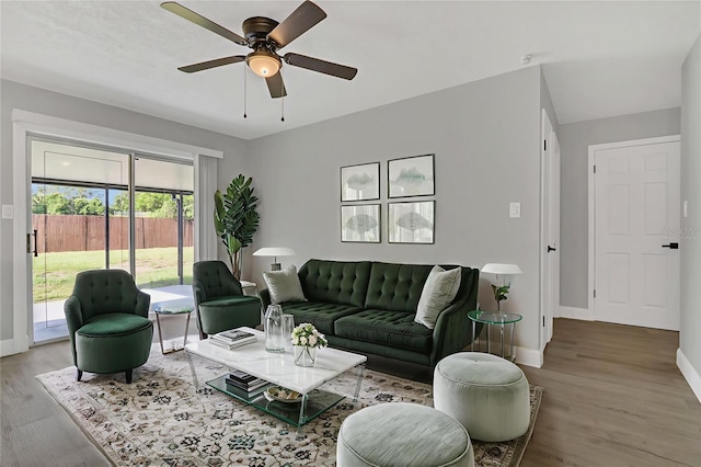 5904 Altec Rd, Orlando, FL 32808 - living area featuring wood finished floors and ceiling fan