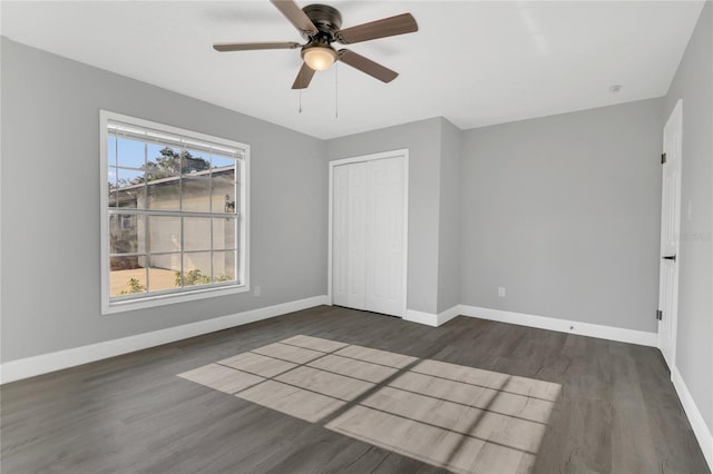 5904 Altec Rd, Orlando, FL 32808 - unfurnished bedroom featuring wood finished floors, a closet, and a ceiling fan