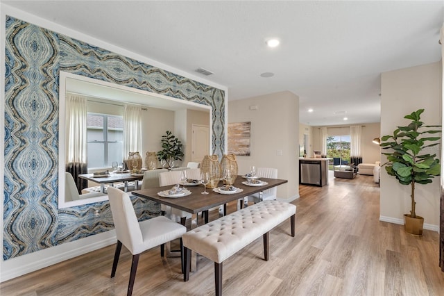 3367 Wynwood Forest Dr, Ocoee, FL 34761 - dining space featuring light wood-style flooring and recessed lighting