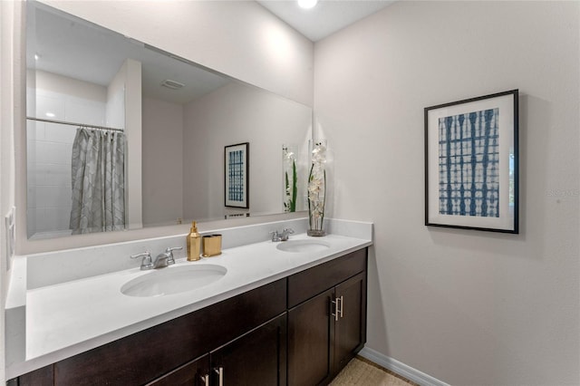 3367 Wynwood Forest Dr, Ocoee, FL 34761 - bathroom featuring double vanity and a shower with shower curtain