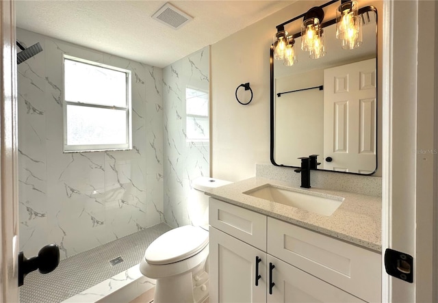 4219 Chateau Rd, Orlando, FL 32808 - bathroom featuring vanity and a marble finish shower