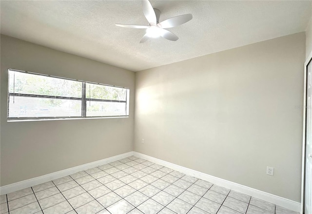 4219 Chateau Rd, Orlando, FL 32808 - empty room with a textured ceiling, ceiling fan, and light tile patterned flooring