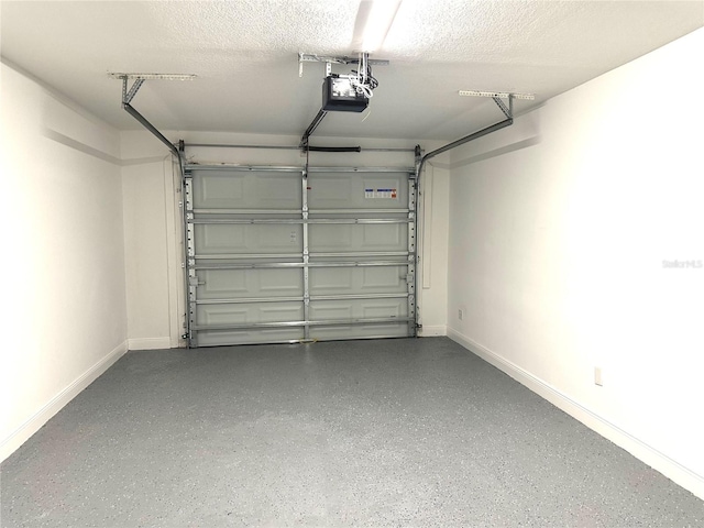 4219 Chateau Rd, Orlando, FL 32808 - garage with a garage door opener and baseboards