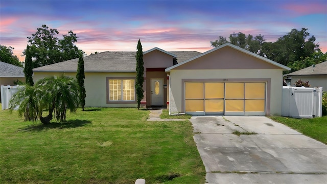 1040 Cannock Dr, Kissimmee, FL 34758 - ranch-style house with concrete driveway, stucco siding, a garage, and a shingled roof
